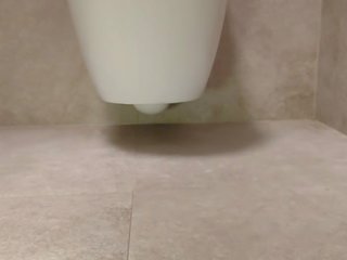 Alluring feet in the toilet